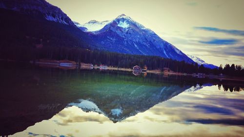 Scenic view of lake with mountains in background