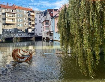 River amidst buildings in city