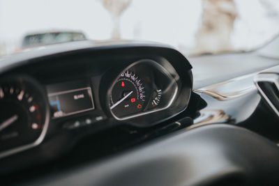 Close-up of speedometer in car