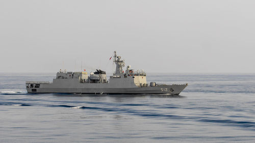 Ship in sea against clear sky