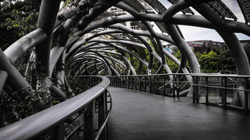 Walking bridge in yantian central park, high angle view of spiral staircase