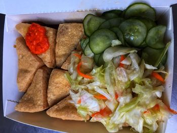 High angle view of chopped vegetables in plate