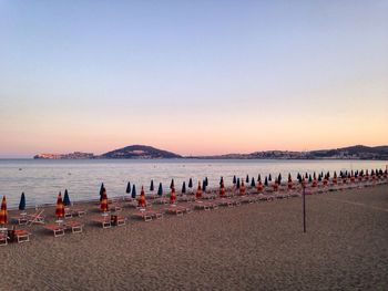 Scenic view of beach against clear sky