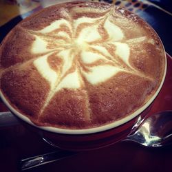 Close-up of coffee cup on table