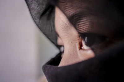 Close-up of woman in naqaab looking away