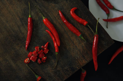 High angle view of red chili peppers on table