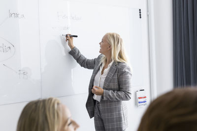Woman having presentation at business meeting