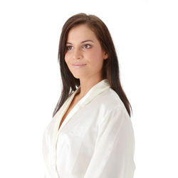 Portrait of a smiling young woman over white background