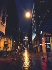 Illuminated street at night