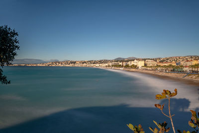 Scenic view of sea against clear blue sky