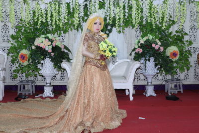 Bride holding bouquet during celebration