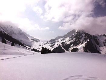 Scenic view of snowcapped mountains