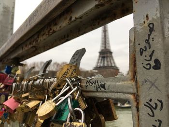 Close-up of padlocks on bridge