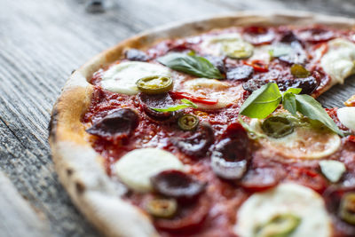 Close-up of pizza served in plate