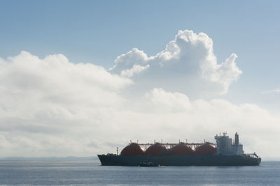  view of an oil tanker sailing in the bay of todos santos, brazil.