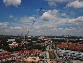 Aerial view of city against sky