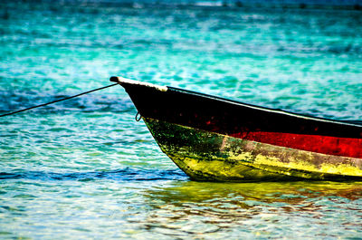 Boat moored in swimming pool