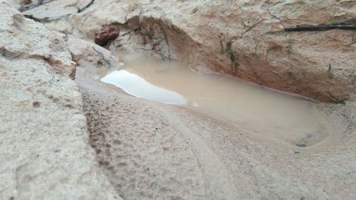 High angle view of rock formation in water