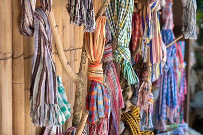 Clothes hanging at market stal
