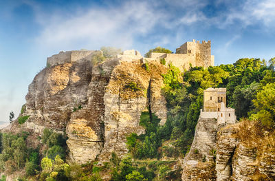 View of old ruins against cloudy sky