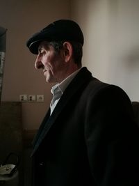 Thoughtful mature man at home
