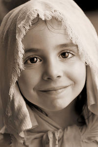 Close-up portrait of smiling girl