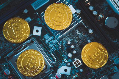 High angle view of coins on table