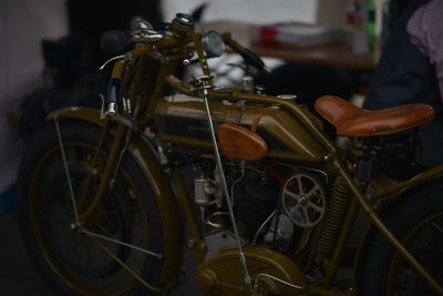 Bicycles parked by motorcycle