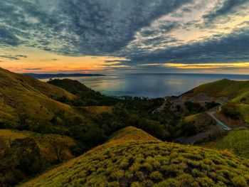 Scenic view of landscape against sky during sunset