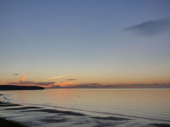 Scenic view of sea at sunset