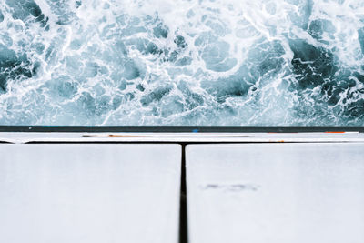 High angle view of boat sailing on sea