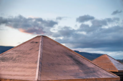 Close-up of roof of building against sky
