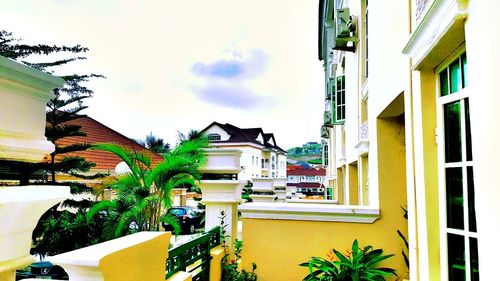 Buildings in city against sky