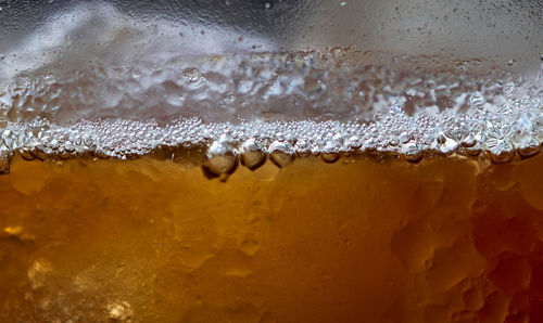 Full frame shot of beer in glass
