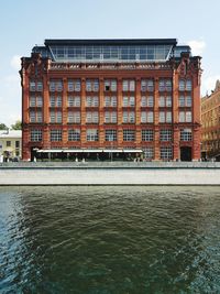 View of building against cloudy sky