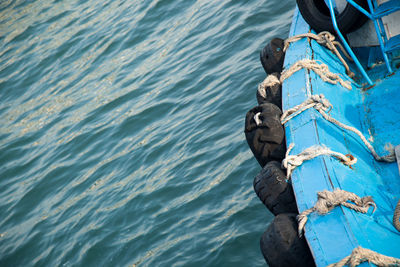 High angle view of blue boat in sea