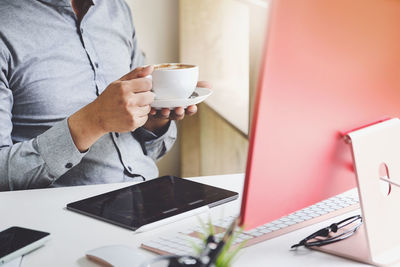 Man using laptop on table