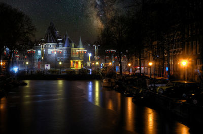 Illuminated buildings in city at night