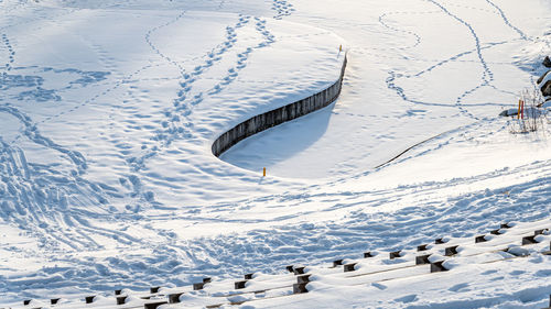 High angle view of snow covered land