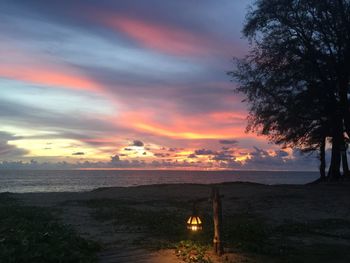 Scenic view of sea against sky at sunset