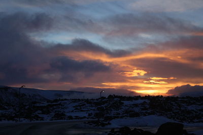 Scenic view of dramatic sky during sunset