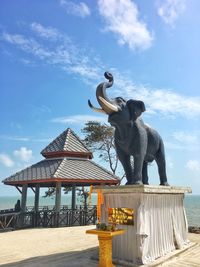 Statue against sky