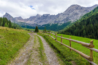 Landscape with mountain range in background