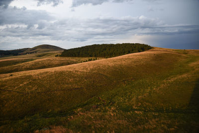 Scenic view of land against sky