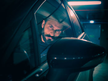 Close-up of a man in car