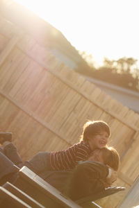 Father and son playing in backyard