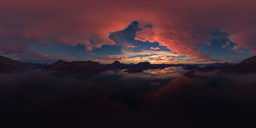 Scenic view of mountains against sky during sunset