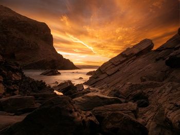 Scenic view of sea against sky during sunset