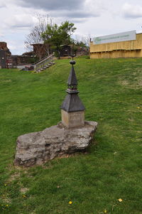 View of stone structure against cloudy sky