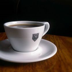 Close-up of coffee cup on table